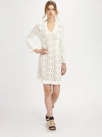 Eye-catching crochet in a simple split-neck sheath; the perfect wear-it-anything wardrobe staple.Split V necklineLong sleevesFlat frontSlip includedAbout 16 from natural waistViscoseDry cleanImportedModel shown is 5'9½ (175cm) wearing US size Small. Eye-catching crochet in a simple split-neck sheath; the perfect wear-it-anything wardrobe staple.Split V necklineLong sleevesFlat frontSlip includedAbout 16 from natural waistViscoseDry cleanImportedModel shown is 5'9½ (175cm) wearing US size Small.