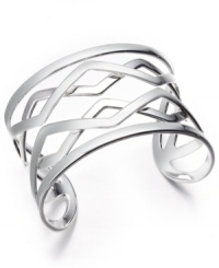 Perfect your look with a simple pattern. Touch of Silver's beautiful open-cut cuff bracelet features a crisscross pattern in silver over brass. Approximate width: 1-1/2 inches. Perfect your look with a simple pattern. Touch of Silver's beautiful open-cut cuff bracelet features a crisscross pattern in silver over brass. Approximate width: 1-1/2 inches.