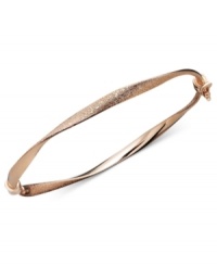 Capture the must-have trend of the season with simple style in caramel color. Bangle features a subtle twist and textured finish in chic 14k rose gold. Approximate diameter: 2-3/8 inches. Capture the must-have trend of the season with simple style in caramel color. Bangle features a subtle twist and textured finish in chic 14k rose gold. Approximate diameter: 2-3/8 inches.