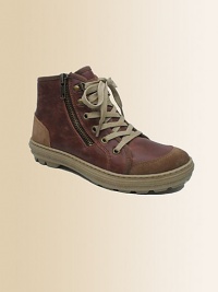 With rugged laces, an easy zip-up style and suede accents at the toe and heel, these waterproof boots are perfect for everything from a trip to the woods to a trip to the park.Lace frontSide zip closureLeather upperSynthetic shearling liningRubber solePadded insoleNike Air technologyWaterproofImported With rugged laces, an easy zip-up style and suede accents at the toe and heel, these waterproof boots are perfect for everything from a trip to the woods to a trip to the park.Lace frontSide zip closureLeather upperSynthetic shearling liningRubber solePadded insoleNike Air technologyWaterproofImported