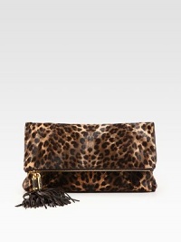 Luxurious haircalf in a chic fold-over design accented with oversized tassel detail and radiant hardware.Top zip closure with magnetic flapOne open pocket under flapOne inside zip pocketTwo inside open pocketsLeather lining13½W X 8H X 1DImported Luxurious haircalf in a chic fold-over design accented with oversized tassel detail and radiant hardware.Top zip closure with magnetic flapOne open pocket under flapOne inside zip pocketTwo inside open pocketsLeather lining13½W X 8H X 1DImported