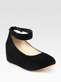 An adjustable ankle strap adds contemporary appeal to this suede silhouette with a hidden wedge and platform. Hidden wedge, 2½ (65mm)Hidden platform, 1¼ (30mm)Compares to a 1¼ heel (30mm)Suede upperAdjustable ankle strap with snap closuresLeather lining and solePadded insoleMade in ItalyOUR FIT MODEL RECOMMENDS ordering true size. An adjustable ankle strap adds contemporary appeal to this suede silhouette with a hidden wedge and platform. Hidden wedge, 2½ (65mm)Hidden platform, 1¼ (30mm)Compares to a 1¼ heel (30mm)Suede upperAdjustable ankle strap with snap closuresLeather lining and solePadded insoleMade in ItalyOUR FIT MODEL RECOMMENDS ordering true size.