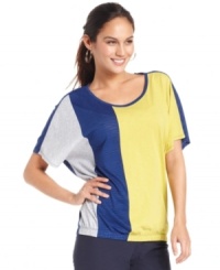 Style&co. Sport's colorblocked top is perfect for a trip to the gym or even lounging around the house! Its banded hem creates a relaxed fit for women of all shapes and sizes. Style&co. Sport's colorblocked top is perfect for a trip to the gym or even lounging around the house! Its banded hem creates a relaxed fit for women of all shapes and sizes.