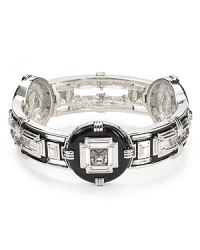 The Art Deco look plays muse to this plated metal T Tahari bangle, with its bold silhouette and luxurious splashes of pavé crystals. The Art Deco look plays muse to this plated metal T Tahari bangle, with its bold silhouette and luxurious splashes of pavé crystals.