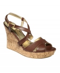 Made of the most supple leather ever, GUESS's Pernella platform wedge sandals will be your new go-to shoe. Made of the most supple leather ever, GUESS's Pernella platform wedge sandals will be your new go-to shoe.