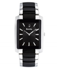 The darker side of classic. Push the envelope with this watch by Bulova. Stainless steel bracelet with black-plated center links and rectangular case with black-plated bezel. Black dial features applied silver tone stick indices, two hands and logo. Quartz movement. Water resistant to 30 meters. Three-year limited warranty. The darker side of classic. Push the envelope with this watch by Bulova. Stainless steel bracelet with black-plated center links and rectangular case with black-plated bezel. Black dial features applied silver tone stick indices, two hands and logo. Quartz movement. Water resistant to 30 meters. Three-year limited warranty.