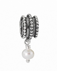 This beveled sterling silver charm features a dangling white pearl, adding instant movement and timeless elegance to your PANDORA bracelet. This beveled sterling silver charm features a dangling white pearl, adding instant movement and timeless elegance to your PANDORA bracelet.