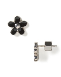 In black or cream, these enamel daisy studs add a hint of femininity to any look. In black or cream, these enamel daisy studs add a hint of femininity to any look.