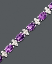 Add a pop of purple for indulgently girly glamour. Oval-cut amethyst (11 ct. t.w.) shines alongside diamond-accented links. Bracelet crafted in sterling silver. Approximate length: 7 inches. Add a pop of purple for indulgently girly glamour. Oval-cut amethyst (11 ct. t.w.) shines alongside diamond-accented links. Bracelet crafted in sterling silver. Approximate length: 7 inches.