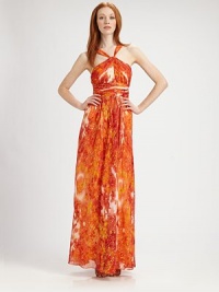Vibrantly hued silk shot through with metallic threads, tailored in a flowing, floor-length design.Halter-style necklineRuched bodiceBanded waistLow backConcealed side zipFully linedAbout 39 from natural waist86% silk/14% metallicDry cleanImportedModel shown is 5'10 (177cm) wearing US size 4. Vibrantly hued silk shot through with metallic threads, tailored in a flowing, floor-length design.Halter-style necklineRuched bodiceBanded waistLow backConcealed side zipFully linedAbout 39 from natural waist86% silk/14% metallicDry cleanImportedModel shown is 5'10 (177cm) wearing US size 4.