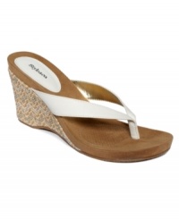 Cork details add dimension to this easy style by Style&co. The Chicklet wedge thong sandals feature an extra padded sole for optimum comfort. Cork details add dimension to this easy style by Style&co. The Chicklet wedge thong sandals feature an extra padded sole for optimum comfort.