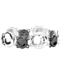 Add a little versatility with two-tone shimmer. Monet's stylish flex bracelet features circular-shaped links in hematite and silver tone mixed metal. Approximate length: 7-1/2 inches. Approximate diameter: 2-1/4 inches. Add a little versatility with two-tone shimmer. Monet's stylish flex bracelet features circular-shaped links in hematite and silver tone mixed metal. Approximate length: 7-1/2 inches. Approximate diameter: 2-1/4 inches.