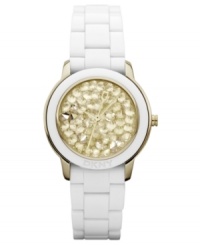 A forward-thinking watch from DKNY -- covered in golden crystals and pristine tones. A forward-thinking watch from DKNY -- covered in golden crystals and pristine tones.