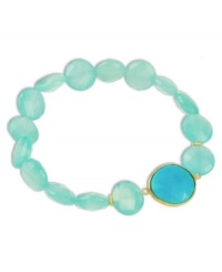 Ocean blue hues add an exotic touch to any look. This stunning stretch bracelet combines polished blue chalcedony (64 ct. t.w.) and turquoise (7-1/5 ct. t.w.) stones in an 18k gold over sterling silver setting. Bracelet stretches to fit wrist. Approximate length: 7-1/2 inches. Ocean blue hues add an exotic touch to any look. This stunning stretch bracelet combines polished blue chalcedony (64 ct. t.w.) and turquoise (7-1/5 ct. t.w.) stones in an 18k gold over sterling silver setting. Bracelet stretches to fit wrist. Approximate length: 7-1/2 inches.