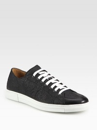 Low-top canvas lace-ups with allover gancini embroidery and contrast sole.Canvas upperLeather liningPadded insoleRubber soleMade in Italy Low-top canvas lace-ups with allover gancini embroidery and contrast sole.Canvas upperLeather liningPadded insoleRubber soleMade in Italy