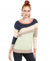 Colorblocking adds a modern edge to this Bar III sweater for a chic layering piece!