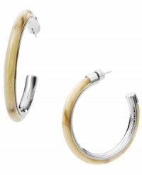 Welcome to the jungle! Safari-inspired styles are super hot this summer, and Michael Kors neutral-hued acetate horn hoops put the haute back into your favorite earring style. Set in silver tone mixed metal. Approximate diameter: 2 inches. Approximate width: 1/4 inch.
