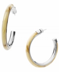 Welcome to the jungle! Safari-inspired styles are super hot this summer, and Michael Kors neutral-hued acetate horn hoops put the haute back into your favorite earring style. Set in silver tone mixed metal. Approximate diameter: 2 inches. Approximate width: 1/4 inch. Welcome to the jungle! Safari-inspired styles are super hot this summer, and Michael Kors neutral-hued acetate horn hoops put the haute back into your favorite earring style. Set in silver tone mixed metal. Approximate diameter: 2 inches. Approximate width: 1/4 inch.