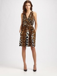 Pump up your look with this fierce animal-printed silhouette of soft-stretch jersey. V-neckSleevelessWrap frontShirring at waistDual slash pocketsElastic waist with self-tieRacerbackFully linedAbout 21 from natural waist95% viscose/5% spandexDry cleanImportedModel shown is 5'9½ (176cm) wearing US size Small. Pump up your look with this fierce animal-printed silhouette of soft-stretch jersey. V-neckSleevelessWrap frontShirring at waistDual slash pocketsElastic waist with self-tieRacerbackFully linedAbout 21 from natural waist95% viscose/5% spandexDry cleanImportedModel shown is 5'9½ (176cm) wearing US size Small.