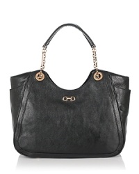 Salvatore Ferragamo's luxurious leather tote with signature Gancio buckle ornaments is the perfect sophisticated silhouette for your everyday essentials. Salvatore Ferragamo's luxurious leather tote with signature Gancio buckle ornaments is the perfect sophisticated silhouette for your everyday essentials.