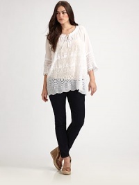 A delicate design featuring spectacular embroidery and classic eyelet details, this top has the fit and arm coverage you want.Self-tie necklineThree-quarter sleevesEmbroidered and eyelet detailsAbout 29 from shoulder to hemRayonMachine washImported A delicate design featuring spectacular embroidery and classic eyelet details, this top has the fit and arm coverage you want.Self-tie necklineThree-quarter sleevesEmbroidered and eyelet detailsAbout 29 from shoulder to hemRayonMachine washImported