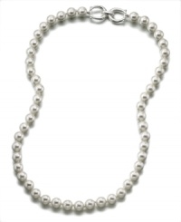 Add a taste of timeless glamor to your wardrobe with this radiant glass pearl (10 mm) necklace. Set in rhodium-plated silvertone mixed metal. Measures approximately 24 inches long. Add a taste of timeless glamor to your wardrobe with this radiant glass pearl (10 mm) necklace. Set in rhodium-plated silvertone mixed metal. Measures approximately 24 inches long.