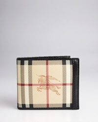 Signature elegance: Burberry's check wallet adorned with the equestrian logo makes a dramatic contribution to your everyday life. Every time you pull it from your pocket, people will see that you're a man of distinction. Crafted in fine leather for longevity. Signature elegance: Burberry's check wallet adorned with the equestrian logo makes a dramatic contribution to your everyday life. Every time you pull it from your pocket, people will see that you're a man of distinction. Crafted in fine leather for longevity.
