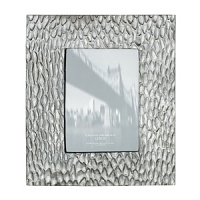 Donna Karan infuses her modern, city-chic aesthetic into this uniquely textured frame from Lenox. Donna Karan infuses her modern, city-chic aesthetic into this uniquely textured frame from Lenox.