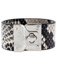 Lock up chic seasonal style! Jessica Simpson's exotic turnlock cuff bracelet features python-printed leather and silver tone mixed metal. Approximate length: 8 inches. Lock up chic seasonal style! Jessica Simpson's exotic turnlock cuff bracelet features python-printed leather and silver tone mixed metal. Approximate length: 8 inches.