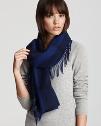 Burberry's iconic tonal check adorns this sophisticated scarf in a plush wool and cashmere blend. Burberry's iconic tonal check adorns this sophisticated scarf in a plush wool and cashmere blend.