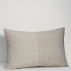 Fashioned in ombre, this decorative pillow underscores Calvin Klein's Tortoise collection.