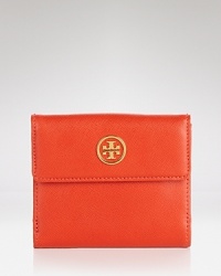 Sleek and polished. Tory Burch's keeps the essentials in their proper place with this leather wallet, accented by an understated logo plaque. Sleek and polished. Tory Burch's keeps the essentials in their proper place with this leather wallet, accented by an understated logo plaque.