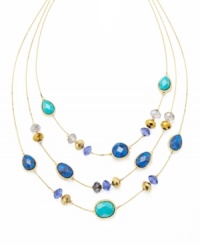 Infuse your look with summery style. Charter Club's three row illusion necklace shines with the addition of resin beads in varying shades of blue. Setting and beaded accents crafted from gold tone mixed metal. Approximate length: 15 inches + 2-inch extender. Approximate drop: 3 inches. Infuse your look with summery style. Charter Club's three row illusion necklace shines with the addition of resin beads in varying shades of blue. Setting and beaded accents crafted from gold tone mixed metal. Approximate length: 15 inches + 2-inch extender. Approximate drop: 3 inches.