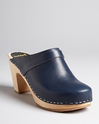 Instantly slip into style with retro-meets-now Swedish Hasbeens wooden clogs.