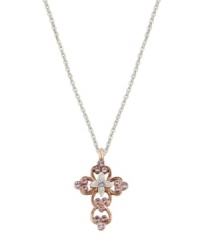 Express your faith with subtle, feminine flair. Vatican pendant features an intricate, scrolling cross highlighted with beautiful violet crystals. Setting and chain crafted in silver tone and rose gold tone mixed metal. Approximate length: 24 inches. Approximate drop: 1-1/4 inches. Express your faith with subtle, feminine flair. Vatican pendant features an intricate, scrolling cross highlighted with beautiful violet crystals. Setting and chain crafted in silver tone and rose gold tone mixed metal. Approximate length: 24 inches. Approximate drop: 1-1/4 inches.