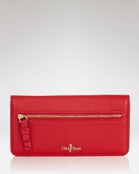 Bulky accessories are an on-the-go fail, which is why we opt for sleek pieces like this leather Cole Haan wallet. It's styled to be slim with a spacious interior. Bulky accessories are an on-the-go fail, which is why we opt for sleek pieces like this leather Cole Haan wallet. It's styled to be slim with a spacious interior.