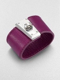 A wide cuff of rich pebble-textured leather is boldly fastened with a polished turn-lock clasp in this simple yet striking design.LeatherRhodium and palladium finishLength, about 8.25Width, about 1.5Turn-lock claspImported