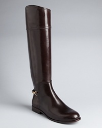 These tall, stately Tory Burch riding boots sum up her uptown-downtown signature style. These tall, stately Tory Burch riding boots sum up her uptown-downtown signature style.