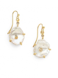 THE LOOKWhite keshi pearl detailsCubic zirconia accentsTextured prong setting18k yellow goldplated brassEar wireTHE MEASUREMENTLength, about 1ORIGINMade in USA THE LOOKWhite keshi pearl detailsCubic zirconia accentsTextured prong setting18k yellow goldplated brassEar wireTHE MEASUREMENTLength, about 1ORIGINMade in USA