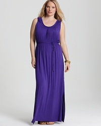 An elegant tie waist defines the fluid silhouette of this Tahari Woman Plus maxi dress. Accent the style with eclectic jewelry and strappy sandals for a touch of bohemian flair. An elegant tie waist defines the fluid silhouette of this Tahari Woman Plus maxi dress. Accent the style with eclectic jewelry and strappy sandals for a touch of bohemian flair.