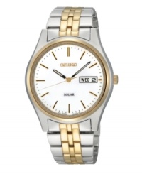 Classic design partners with energy-conserving technology in this solar Seiko watch offering ten-month energy storage, quick start function and energy depletion warning. Two tone stainless steel bracelet and round case. White dial features luminous hands, black and goldtone stick indices, logo and a date window including day of the week. Solar quartz movement. Water resistant to 30 meters. Three-year limited warranty. Classic design partners with energy-conserving technology in this solar Seiko watch offering ten-month energy storage, quick start function and energy depletion warning. Two tone stainless steel bracelet and round case. White dial features luminous hands, black and goldtone stick indices, logo and a date window including day of the week. Solar quartz movement. Water resistant to 30 meters. Three-year limited warranty.