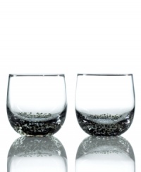 Speckled with black for a stylish twist, Jet tumblers are an eye-catching addition to contemporary tables. This set of cool, easy-care drinking glasses is a perfect match for Denby's equally alluring Jet dinnerware collection.