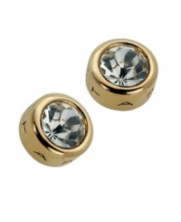 With a bezel setting in gold tone mixed metal and sparkling clear crystals, T Tahari's logo embossed stud earrings epitomize understated elegance. Approximate diameter: 1/2 inch. With a bezel setting in gold tone mixed metal and sparkling clear crystals, T Tahari's logo embossed stud earrings epitomize understated elegance. Approximate diameter: 1/2 inch.