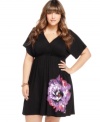 Toast spring's arrival with ING's short sleeve plus size dress, blooming a floral print.