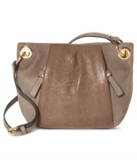 City-sleek with a go-anywhere attitude, this chic silhouette from Vince Camuto will carry you from deskside to dinner date with ease. Supple leather is accented with luxe golden hardware, while plenty of pockets inside and out keep every it-girl exquisitely organized.