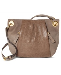 City-sleek with a go-anywhere attitude, this chic silhouette from Vince Camuto will carry you from deskside to dinner date with ease. Supple leather is accented with luxe golden hardware, while plenty of pockets inside and out keep every it-girl exquisitely organized. City-sleek with a go-anywhere attitude, this chic silhouette from Vince Camuto will carry you from deskside to dinner date with ease. Supple leather is accented with luxe golden hardware, while plenty of pockets inside and out keep every it-girl exquisitely organized.