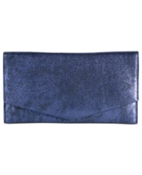 Upgrade your evening style status with this must-have metallic clutch from Cole Haan. Crafted from glam vintage leather and sized for the out-on-the-town essentials, it's your new party partner. Upgrade your evening style status with this must-have metallic clutch from Cole Haan. Crafted from glam vintage leather and sized for the out-on-the-town essentials, it's your new party partner.