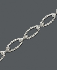 Decadent diamonds with a vintage inspired spin. This sparkling bracelet features round-cut diamond (2 ct. t.w.) in a 14k white gold setting. Approximate length: 7-1/4 inches. Decadent diamonds with a vintage inspired spin. This sparkling bracelet features round-cut diamond (2 ct. t.w.) in a 14k white gold setting. Approximate length: 7-1/4 inches.