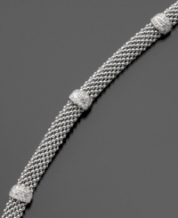 Encircle your wrist with drops of shining sterling silver highlighted by clusters of sparkling round-cut diamonds (1/4 ct. t.w.). Approximate diamond bracelet length: 7-3/4 inches. Encircle your wrist with drops of shining sterling silver highlighted by clusters of sparkling round-cut diamonds (1/4 ct. t.w.). Approximate diamond bracelet length: 7-3/4 inches.