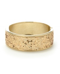 Worth its weight in gold. A glimmering glitter finish sets apart this stunning skinny bangle bracelet from Haskell. Crafted in gold tone metal with a hinge closure. Approximate length: 8 inches. Worth its weight in gold. A glimmering glitter finish sets apart this stunning skinny bangle bracelet from Haskell. Crafted in gold tone metal with a hinge closure. Approximate length: 8 inches.